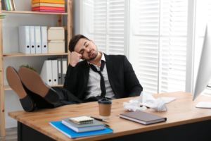 man lazying in office