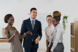 Colleagues chatting in office